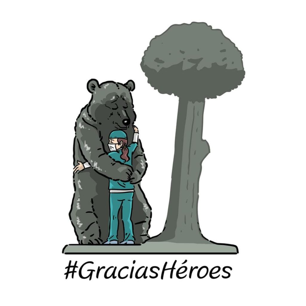 Drawing of the Madrid bear hugging a nurse, with hashtag Gracias Heroes