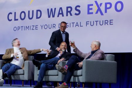 Bob Evans (left) interviews CMO and business podcaster Christopher Lochhead (right) and SF Digital Principal Advisor Christian Anschuetz (center), with John Siefert behind them onstage at Cloud Wars Expo last week.