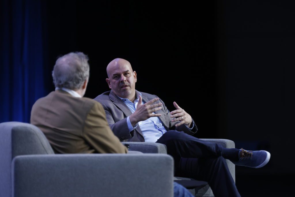 Oracle's Mike Sicilia (right) speaks on his company's acquisition of Cerner and what it means for the future of healthcare in a Thursday morning keynote session.